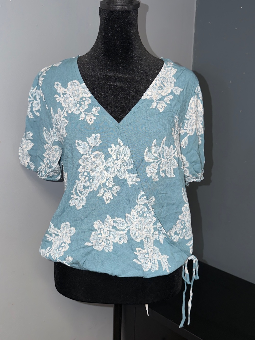 Light Teal Floral Wrap Blouse with White Lace Print